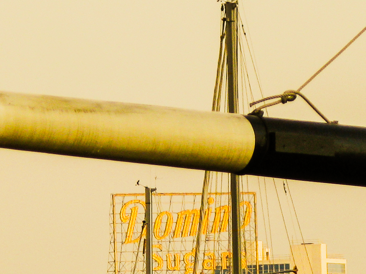 Domino Sugar sign in Baltimore, ship mast in foreview