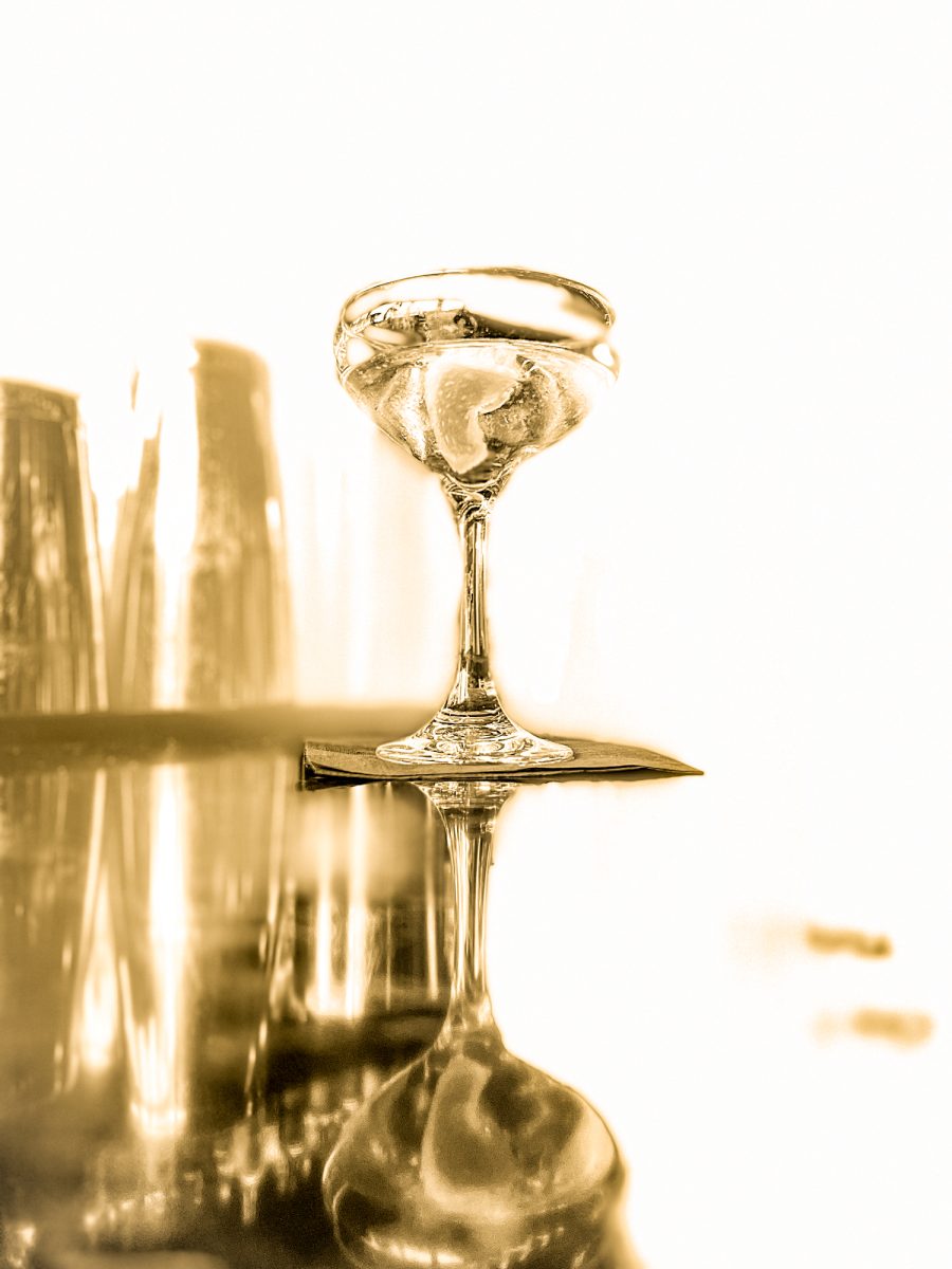 Ketel One martini, up, very dry, twist of lemon